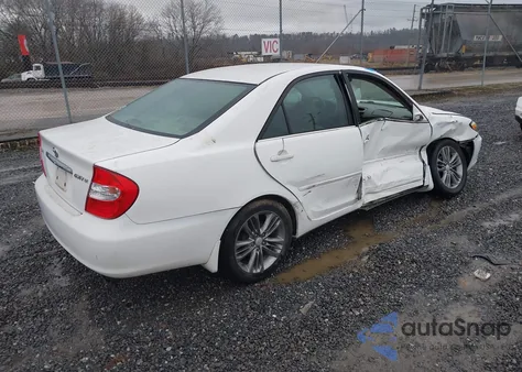 2003 Toyota Camry Le from USA, damaged, VIN 4T1BE32K23U184859